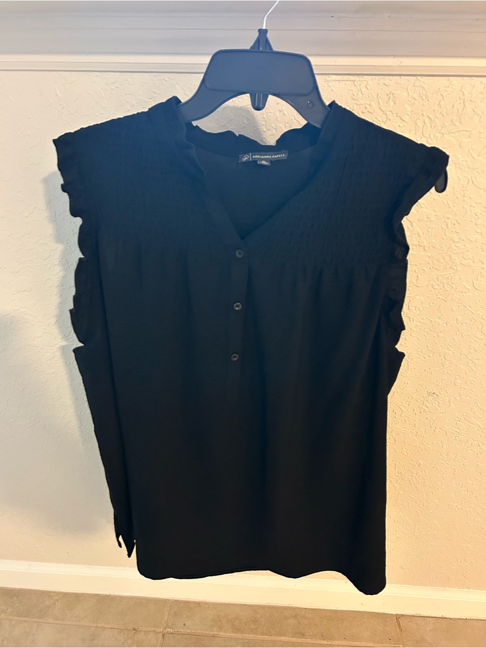 Black Sleeveless Ruffle Yoke Blouse